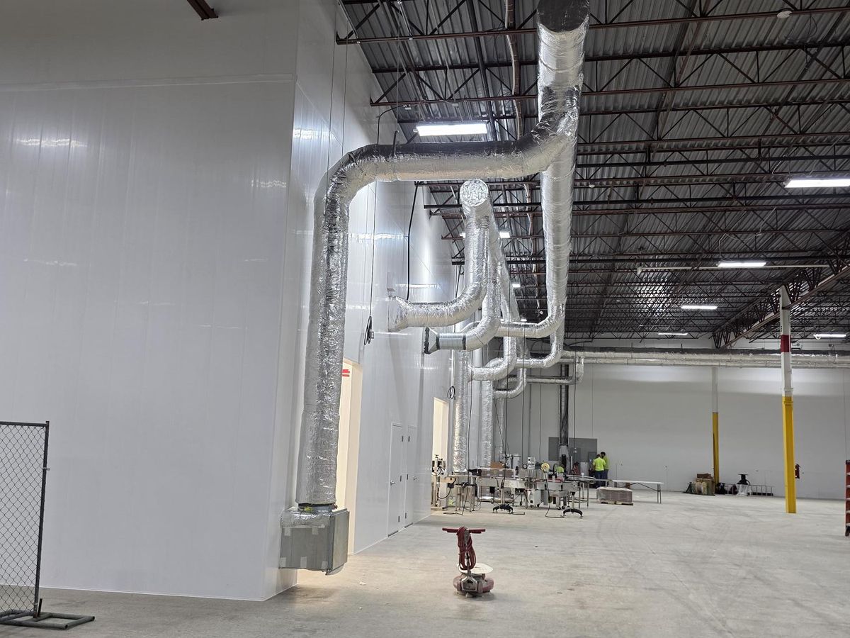 Industrial warehouse interior during fit-out at Steuart Nutrition