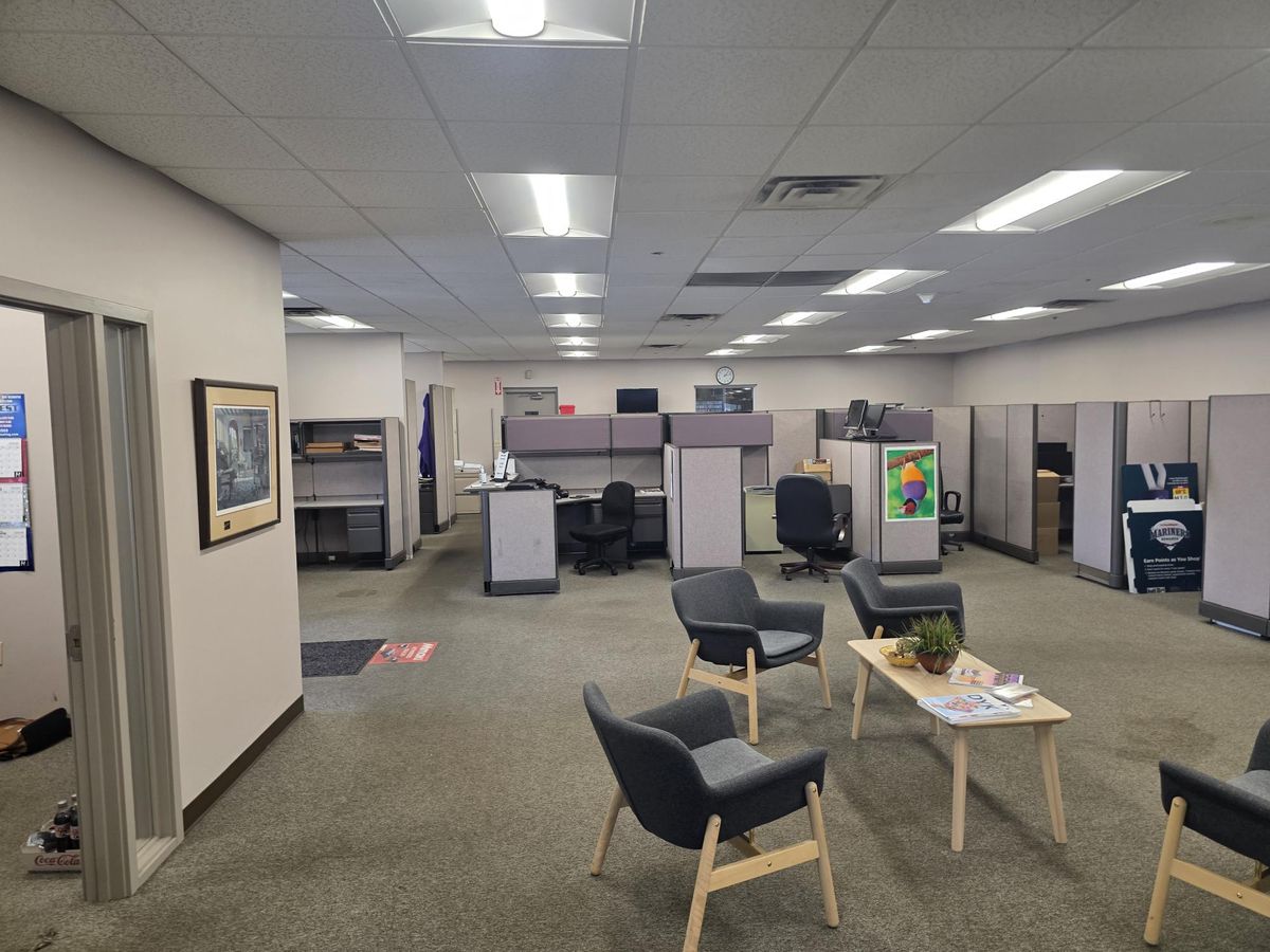 Millcraft office in Cincinnati, Ohio before renovation, showing the existing cubicles and seating area
